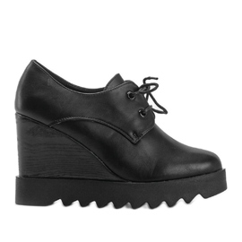 Fekete ékcsizma Andreától Fekete ékcsizma Andreától