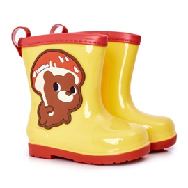 Gyermek sárga galoshes egy mackóval