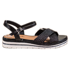 Mannika Fekete szandál a platformon