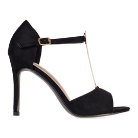 Női fekete velúr pumpák látható Shelovet ujjakkal