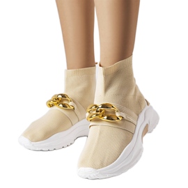 A Baptiste bézs színű tornacipő lánccal