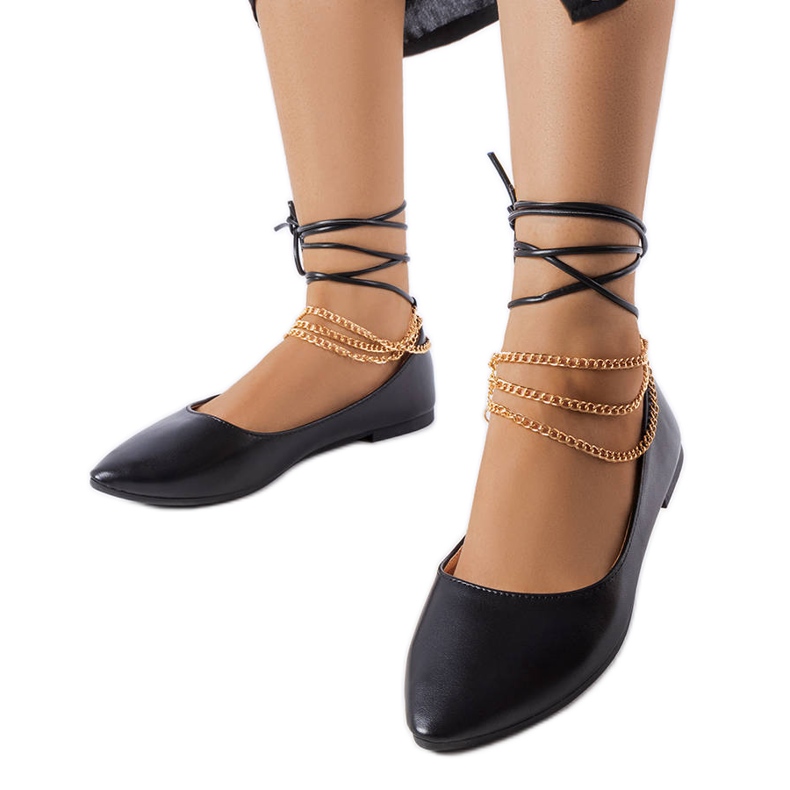 Fekete balerinák dekoratív csattal a Donattól