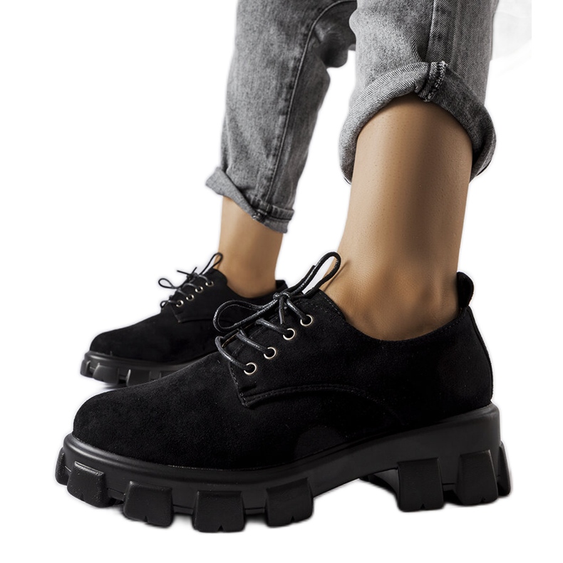 A márka fekete lapos cipői Cloutier