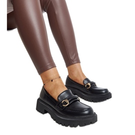 Fekete naplopók Lasima csattal