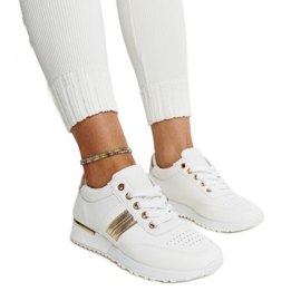 Fehér és arany tornacipők a Nihad gumiplatformon Fehér és arany tornacipők a Nihad gumiplatformon