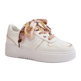 Női tornacipő eko bőrrel és díszítéssel fehér