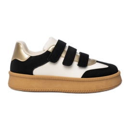 Fémes fekete -fehér betétekkel rendelkező női cipők