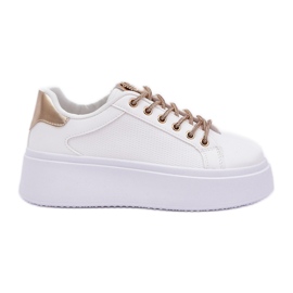 Cipők egy platformon, dekoratív csipkékkel fehér és aranyat Cipők egy platformon, dekoratív csipkékkel fehér és aranyat