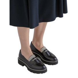 Női átmérőjű fekete cipők Női átmérőjű fekete cipők