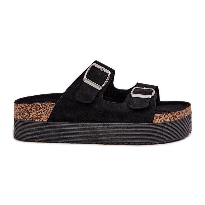 Női papucs egy hatalmas platformon, fekete csatokkal Női papucs egy hatalmas platformon, fekete csatokkal