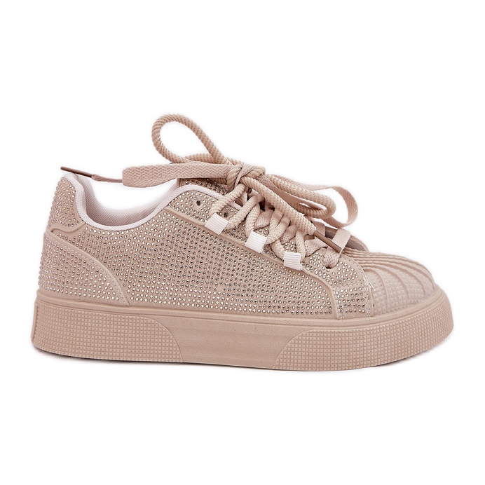 Női cipők dekorációval a platformon bézs