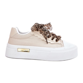 Női cipők egy hatalmas platformon, dekoratív kötéssel bézs Női cipők egy hatalmas platformon, dekoratív kötéssel bézs