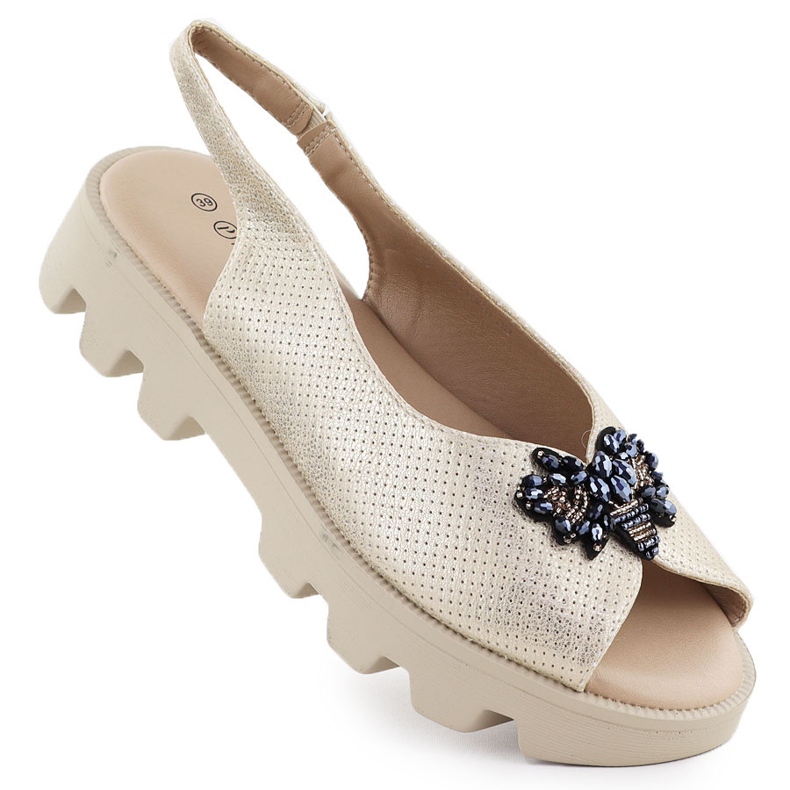 Női szandál a platformon perforált fém arany potocki sz12610 aranysárga