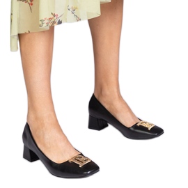 Fekete alacsony, aranyos dekorációval ellátott szivattyúk