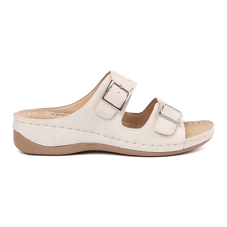 Seastar Papucs egy alacsony ékön, bilincsekkel bézs