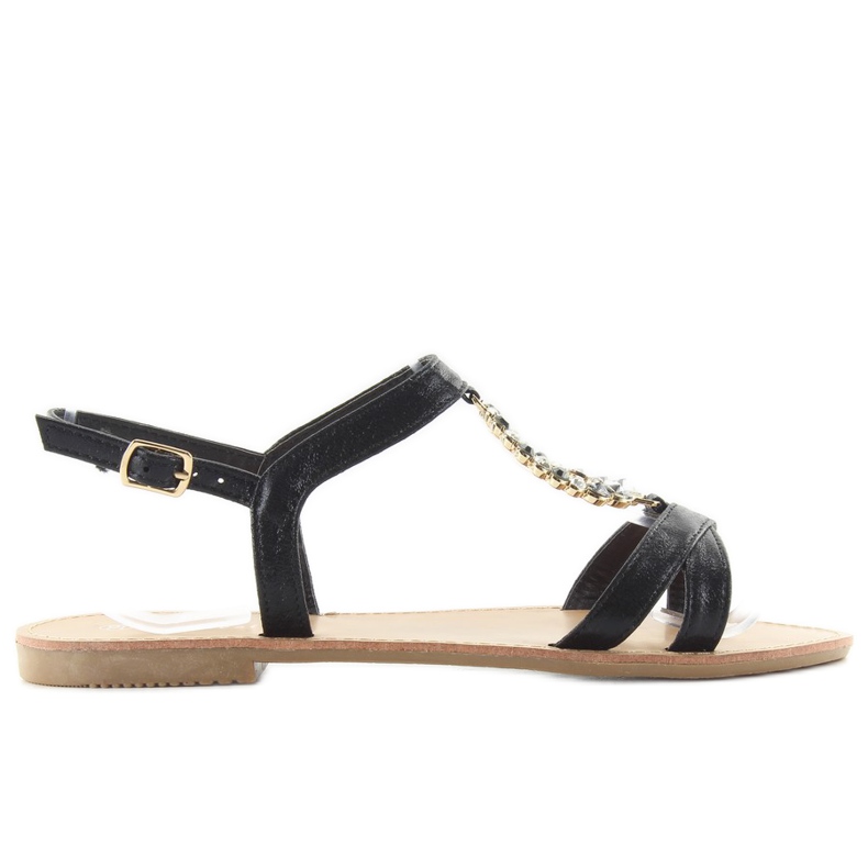 Díszítő fekete kövekkel díszített szandál