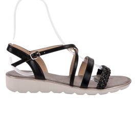 Kylie Fekete szandál a platformon