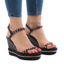 Fekete szandál az 1926 -os platformon Fekete szandál az 1926 -os platformon