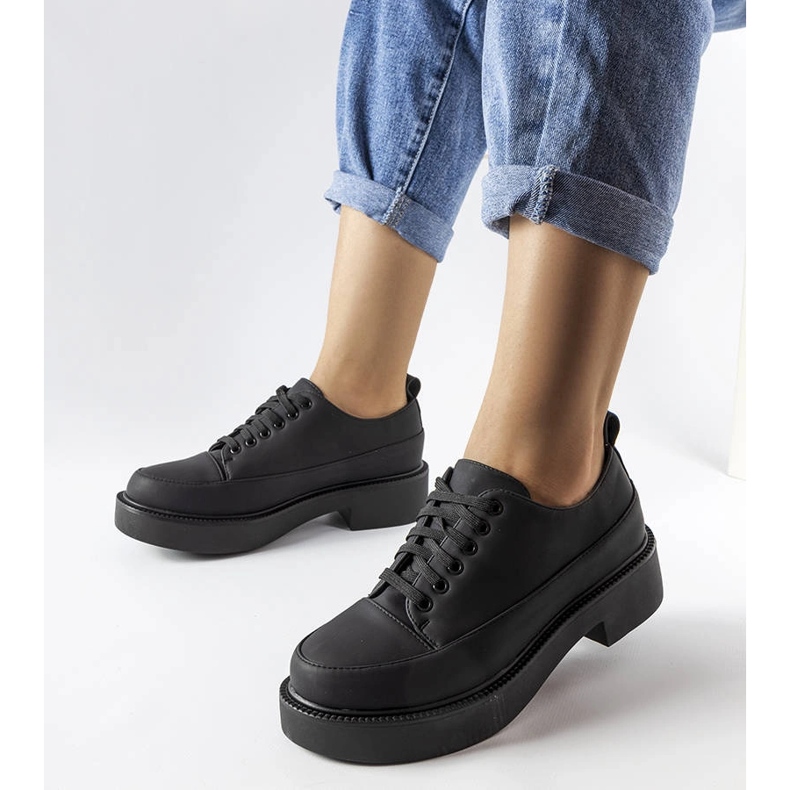 A márka fekete lapos cipője Merico 1