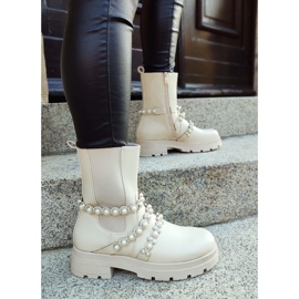 Bézs színű női bokacsizma dekoratív kiegészítőkkel 2