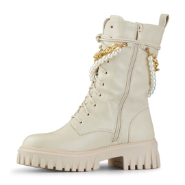 Bézs színű női táskák levehető díszítéssel 1