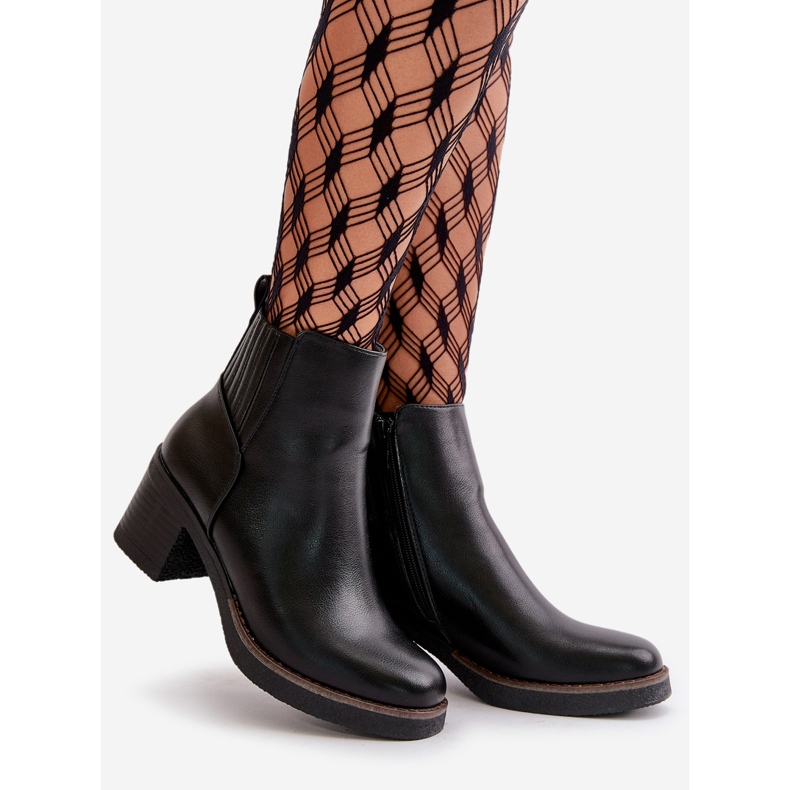 Hőszigetelt női csizma magas sarkú öko bőr fekete irittes 1