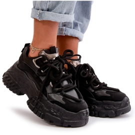 Női sport cipők egy hatalmas fekete talpon 4