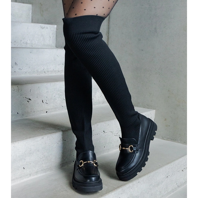 Fekete csizma rugalmas felsőrésszel és lapos sarokkal 1