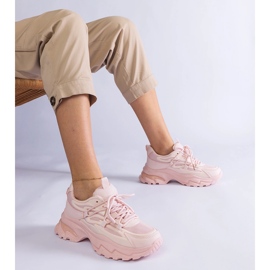 Rózsaszín sport cipők egy hatalmas talpon 1