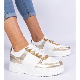 Arany női cipők egy vastag talpon, csillogással díszítve aranysárga 2