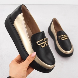 Női bőrcipő a fekete és arany platformon T.sokolski W25-499 1