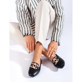 Fekete női naplopók arany díszítéssel a Shelovet cégtől 2