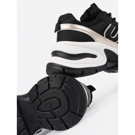 Fekete női cipők arany betétekkel 1