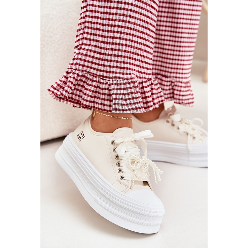 Női cipők a platformon dekoratív kötéssel bézs 2