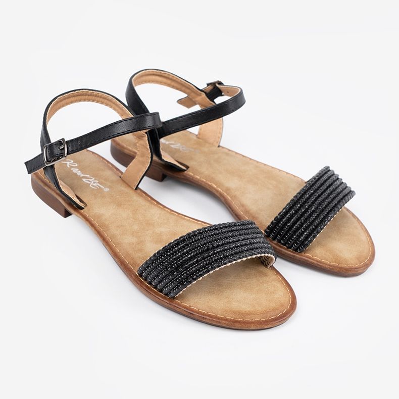 Shelvt Fekete szandál egy lapos talpon 1