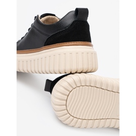 Fekete bőr cipők a Sergio Leone bézs platformon 1