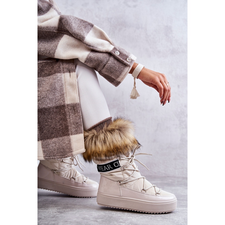 Női bézs fűződő hócsizma 4